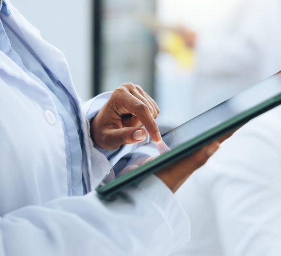 Scientist, hands and tablet in laboratory for development, medical research or innovation. Science, technology and woman with experiment report, pharmaceutical review or study with test feedback.